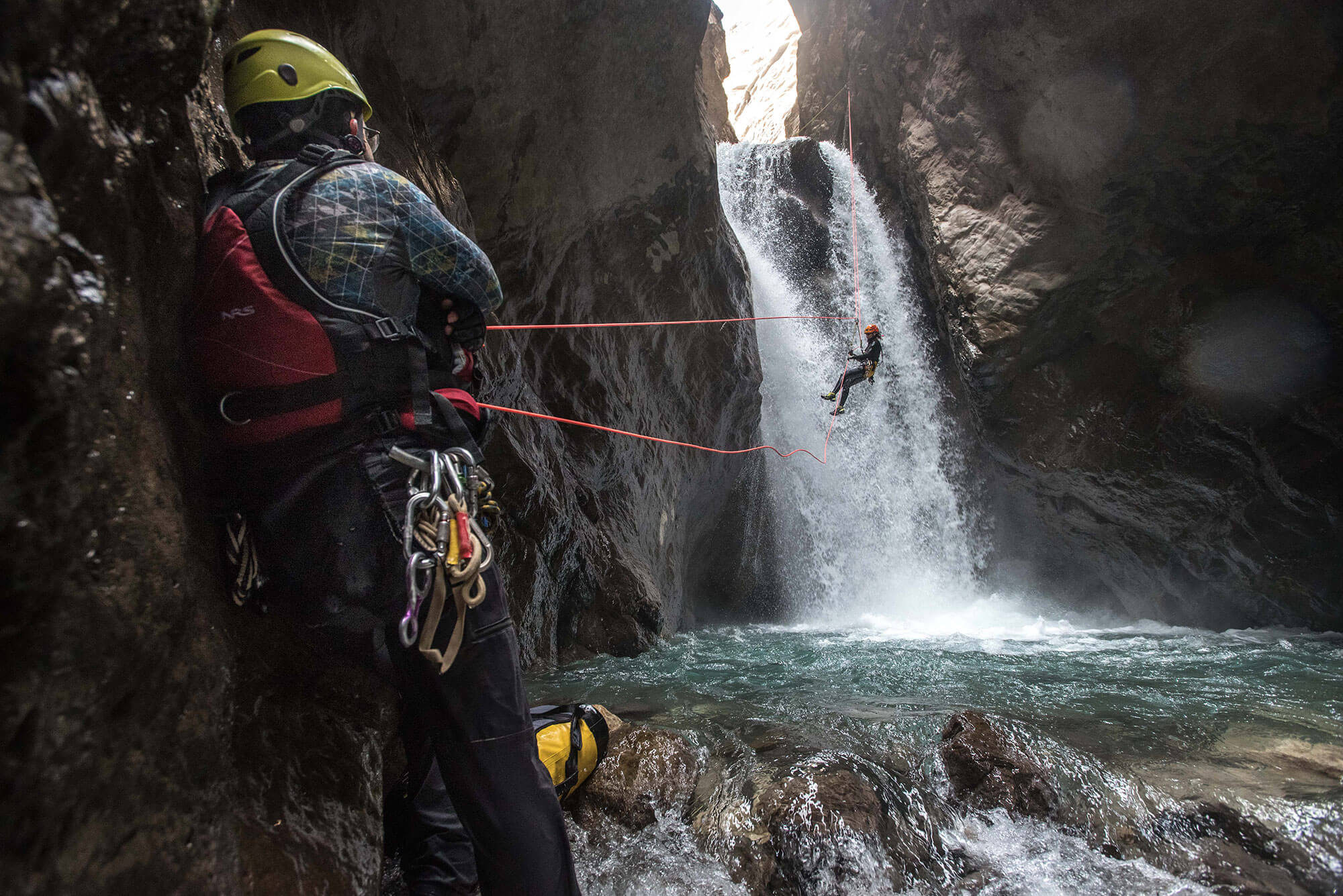 Amir sets up the guided rappel for the rest of the team to overcome the crux. Photo by Gus Schiavon