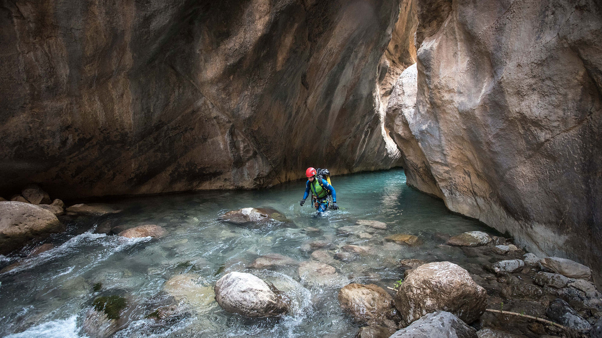 Mohammed Chavoshi exits a gorge in Ziv Davand canyon. Limestone is the main rock type in the Zagros range, where the major descents are located.