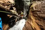 Canyoning in a narrow section of Tukad Dalam in Bali, Indonesia. Photo © Supersmarindo.