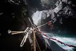 Using a guided rappel to overcome a dangerous pool